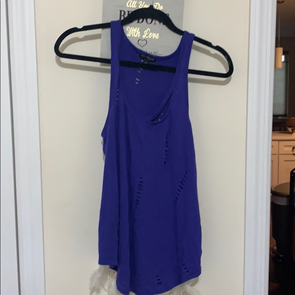 Sleeveless top with vintage looking slits